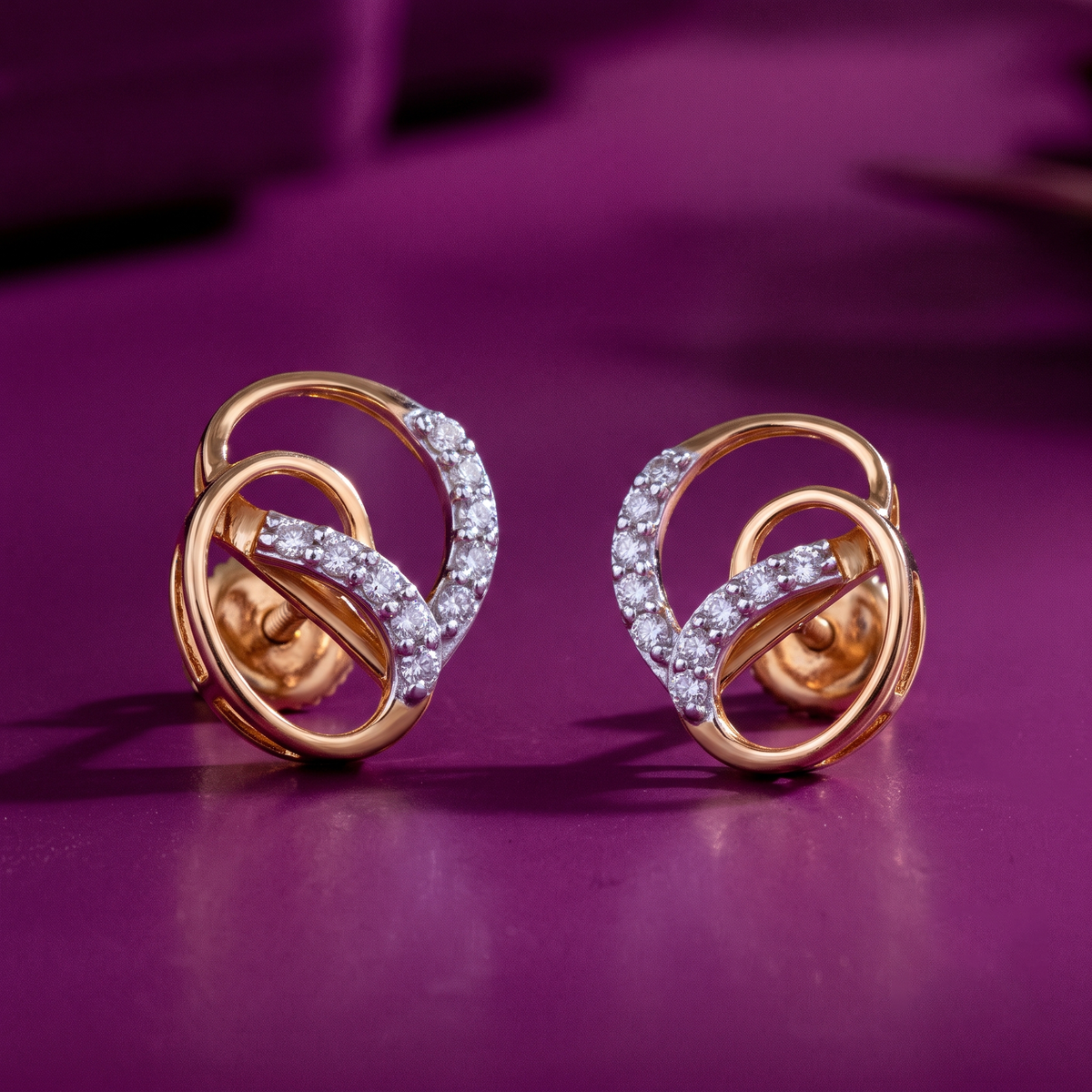 Curved Swirl Diamond Earrings in Rose Gold